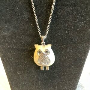 Enameled white owl pendant with chain.
